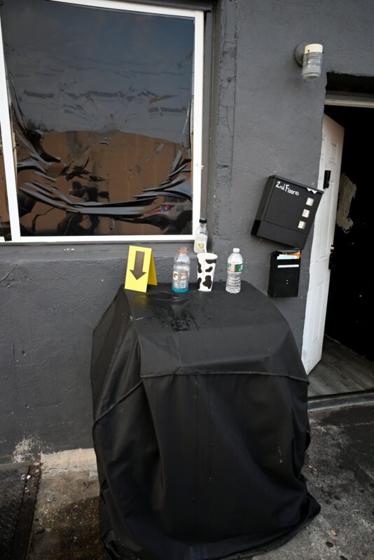 The outside view of the front door and a window at Nipsey's Hookah Lounge in Philadelphia